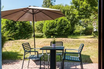 Ein Garten an der Unterkunft Windrose 09