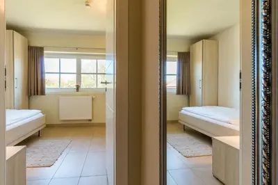Ein Badezimmer in der Unterkunft An den Boddenwiesen 01