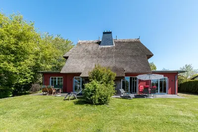 Ein Garten an der Unterkunft An den Boddenwiesen 02