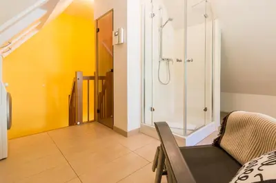 Ein Badezimmer in der Unterkunft An den Boddenwiesen 02