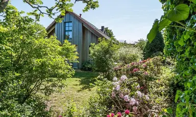 Ein Garten an der Unterkunft Alte Tischlerei 01