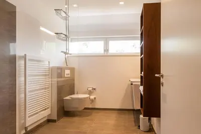 Ein Badezimmer in der Unterkunft Zweienhaus 02