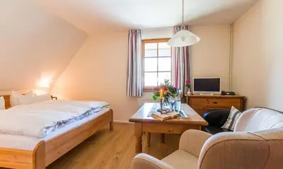 Ein Bett oder Betten in einem Zimmer der Unterkunft Haus am Bodden 01