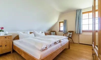 Ein Bett oder Betten in einem Zimmer der Unterkunft Haus am Bodden 02