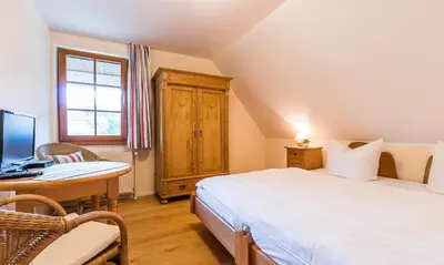 Ein Bett oder Betten in einem Zimmer der Unterkunft Haus am Bodden 02