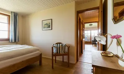 Ein Bett oder Betten in einem Zimmer der Unterkunft Haus am Bodden 03