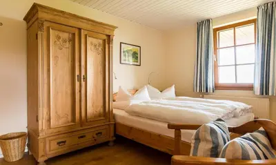 Ein Bett oder Betten in einem Zimmer der Unterkunft Haus am Bodden 03