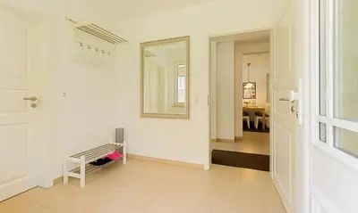 Ein Bett oder Betten in einem Zimmer der Unterkunft Strandhaus Gabriella 02