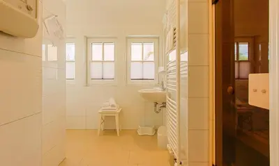 Ein Badezimmer in der Unterkunft Strandhaus Gabriella 02