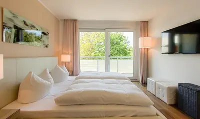 Ein Bett oder Betten in einem Zimmer der Unterkunft Blue Sky