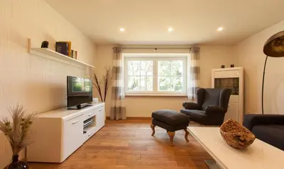 TV/Unterhaltungsangebot in der Unterkunft Haus Schilfkante - Wohnung 1