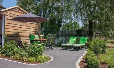 Ein Garten an der Unterkunft Haus Schilfkante - Wohnung 1
