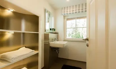 Ein Bett oder Betten in einem Zimmer der Unterkunft Haus Schilfkante - Wohnung 1