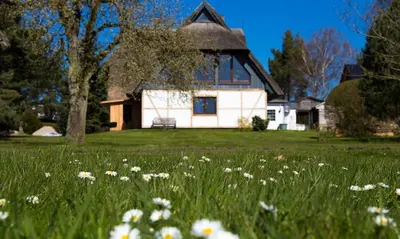 Ein Garten an der Unterkunft Haus Schilfkante - Wohnung 1