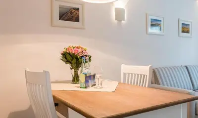 Ein Sitzbereich in der Unterkunft Dünenblick 01