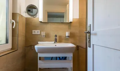 Ein Badezimmer in der Unterkunft Dünenblick 01