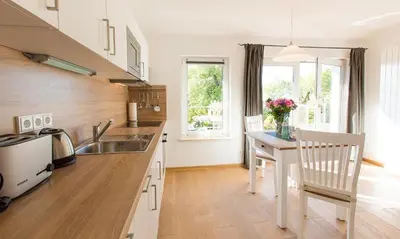 Küche/Küchenzeile in der Unterkunft Dünenblick 02