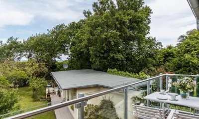 Ein Balkon oder eine Terrasse in der Unterkunft Dünenblick 03