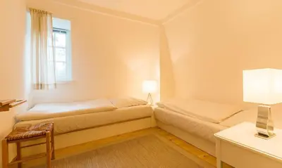 Ein Bett oder Betten in einem Zimmer der Unterkunft Villa Sonnenfrieden 02