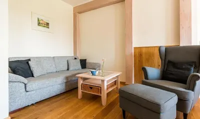 Ein Sitzbereich in der Unterkunft Haus Schilfkante - Wohnung 2