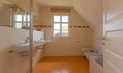 Ein Badezimmer in der Unterkunft Klönhus