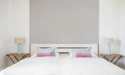 Ein Bett oder Betten in einem Zimmer der Unterkunft Hof Zeesenblick 01