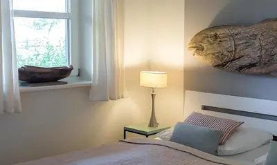 Ein Bett oder Betten in einem Zimmer der Unterkunft Hof Zeesenblick 01