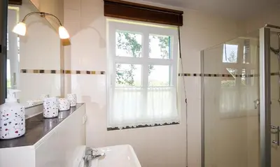 Ein Badezimmer in der Unterkunft Windlicht