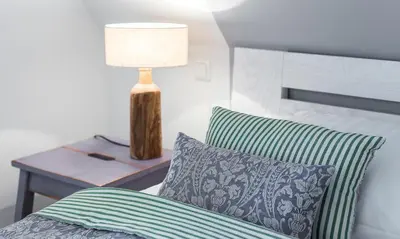 Ein Bett oder Betten in einem Zimmer der Unterkunft Hof Zeesenblick 03