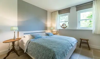 Ein Bett oder Betten in einem Zimmer der Unterkunft Hof Zeesenblick 04