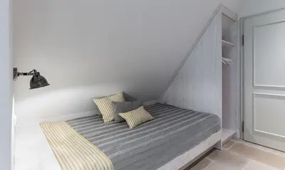 Ein Bett oder Betten in einem Zimmer der Unterkunft Hof Zeesenblick 06