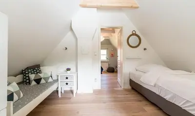 Ein Bett oder Betten in einem Zimmer der Unterkunft SiebenFinken