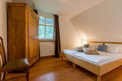 Ein Bett oder Betten in einem Zimmer der Unterkunft Fischers Ferienhaus