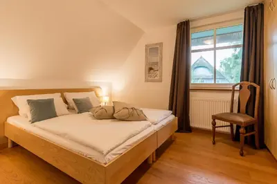 Ein Bett oder Betten in einem Zimmer der Unterkunft Fischers Ferienhaus