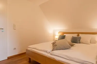 Ein Bett oder Betten in einem Zimmer der Unterkunft Fischers Ferienhaus