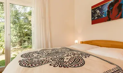 Ein Bett oder Betten in einem Zimmer der Unterkunft Meertraum