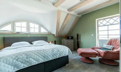 Ein Bett oder Betten in einem Zimmer der Unterkunft Pommernhus Ostseeblick