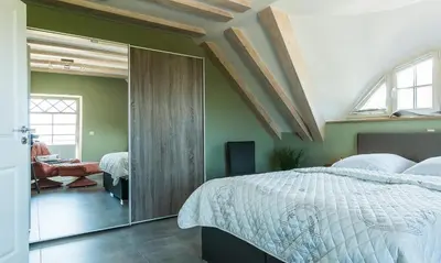 Ein Bett oder Betten in einem Zimmer der Unterkunft Pommernhus Ostseeblick