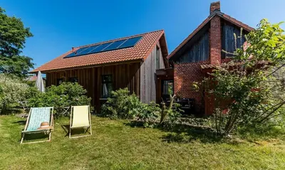 Ein Garten an der Unterkunft Alte Tischlerei 02