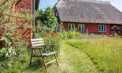 Ein Garten an der Unterkunft Alte Tischlerei 02