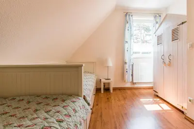 Ein Bett oder Betten in einem Zimmer der Unterkunft Hus in Luv