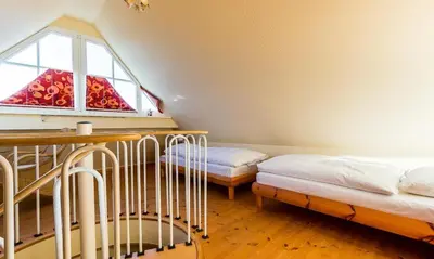 Ein Bett oder Betten in einem Zimmer der Unterkunft Madlen