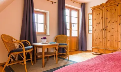 Ein Bett oder Betten in einem Zimmer der Unterkunft Ahrenshooper Landhaus 04