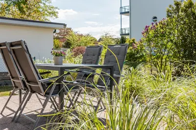 Ein Garten an der Unterkunft Haus Ostseenixe 02