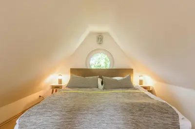 Ein Bett oder Betten in einem Zimmer der Unterkunft Haus Ostseenixe 05