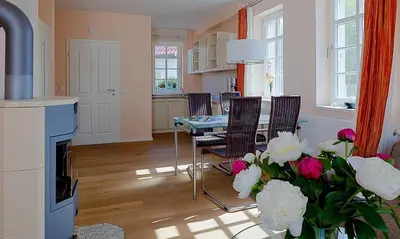 Ein Sitzbereich in der Unterkunft Boddensegler