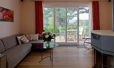 Ein Sitzbereich in der Unterkunft Boddensegler