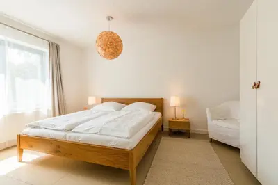 Ein Bett oder Betten in einem Zimmer der Unterkunft Drei Akazien Wohnung 1