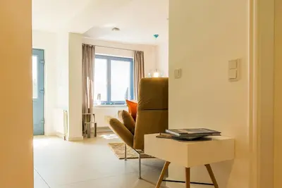 Ein Sitzbereich in der Unterkunft Drei Akazien Wohnung 2