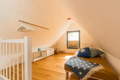 Ein Bett oder Betten in einem Zimmer der Unterkunft Drei Akazien Wohnung 3